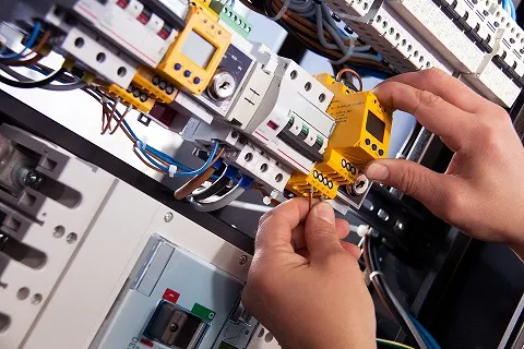 while on duty of commercial-electrician-service, electrician burbank ca is checking circuit of a commercial project.